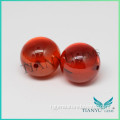 Orange round beads cabochons and beads for jewelry